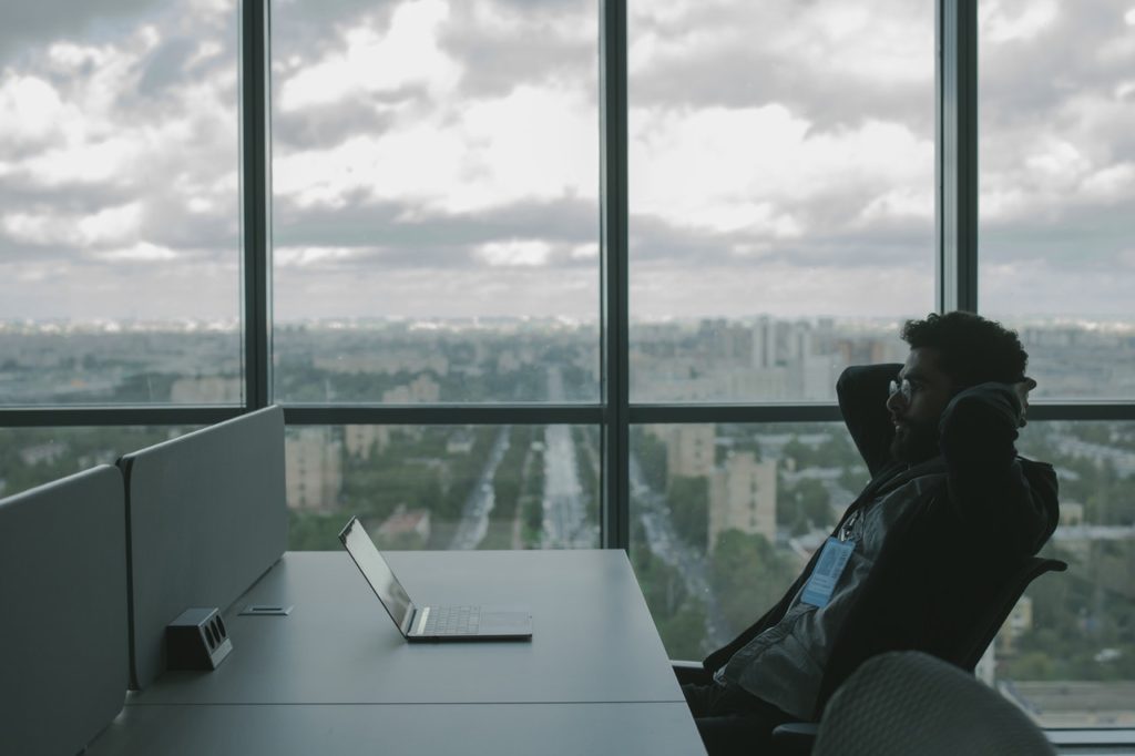 Man on Laptop in Office